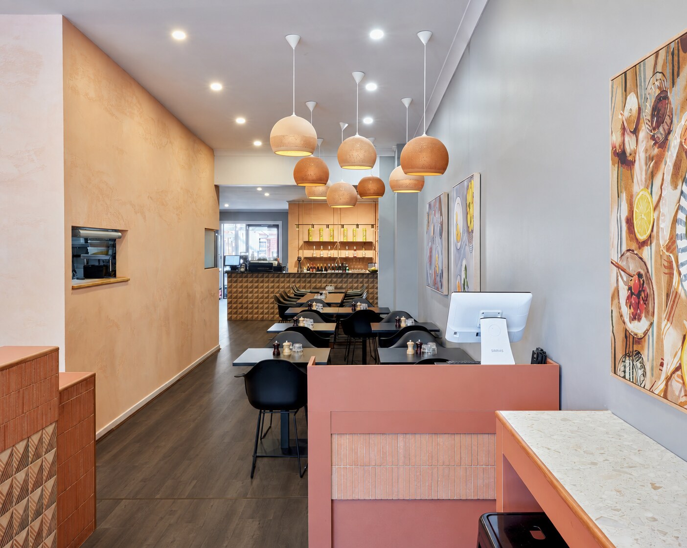 Layered lighting and tactile finishes in the Bella Mamma restaurant interior