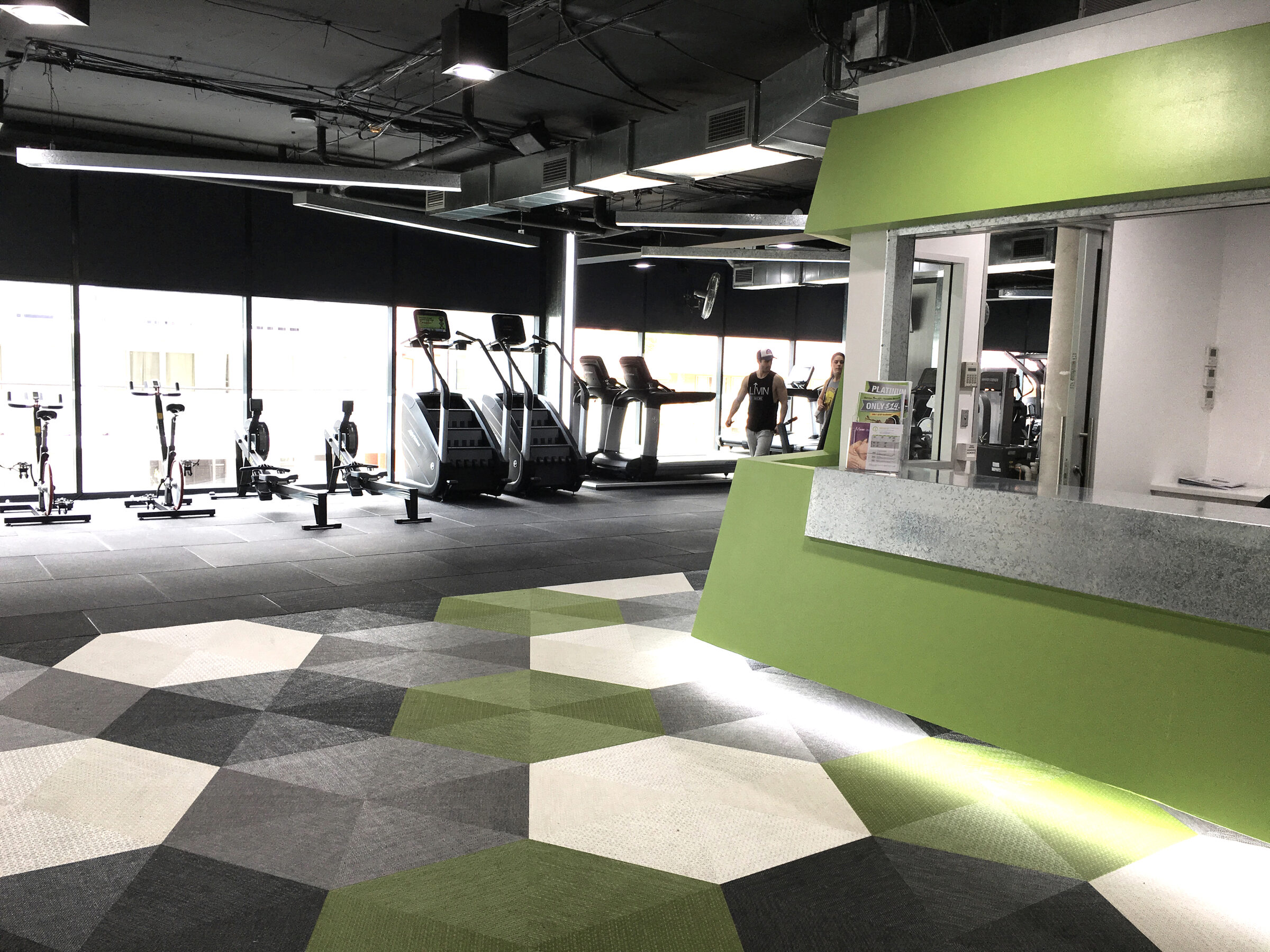Club Lime Fitness interior with bold wayfinding and high-energy training zones