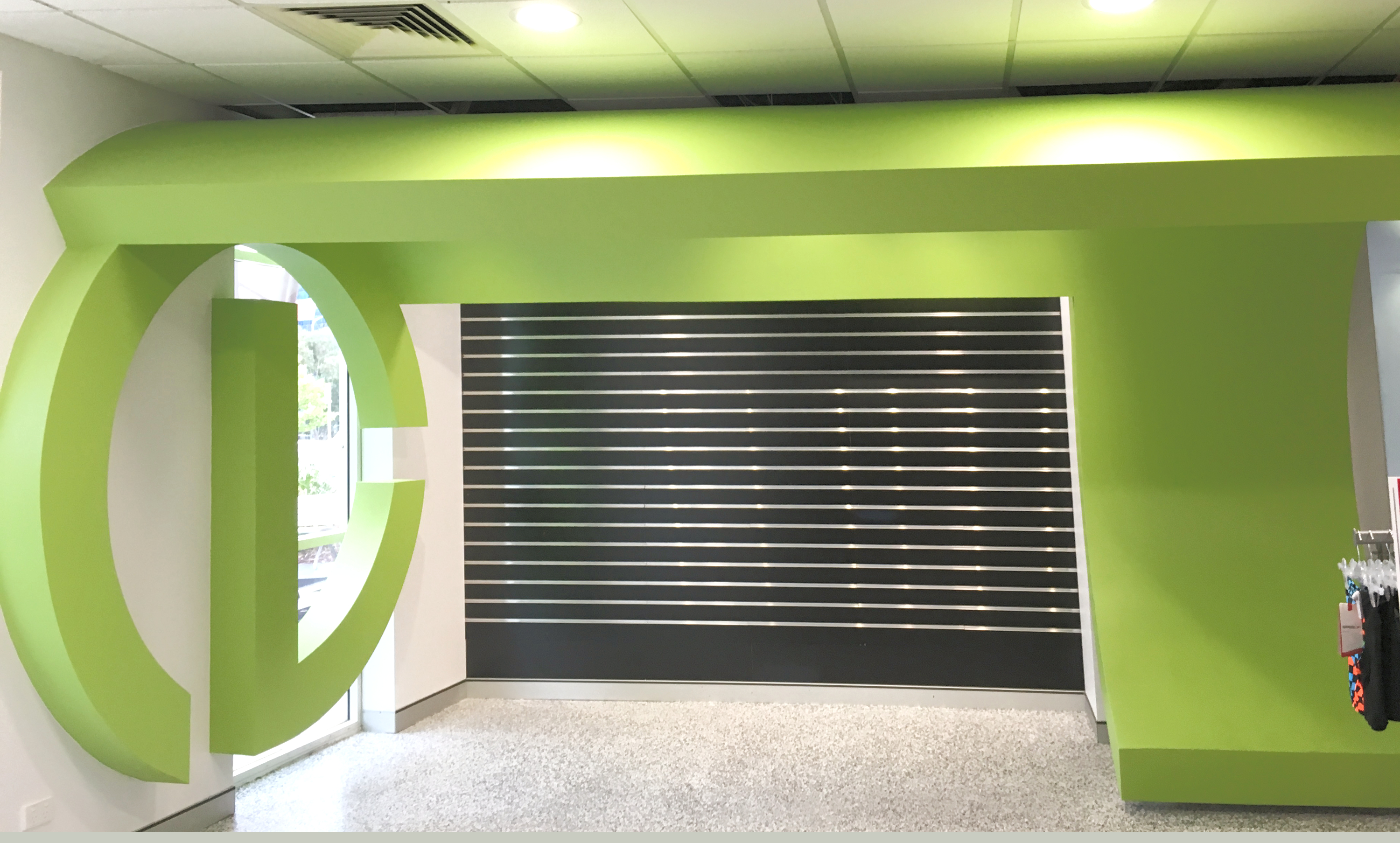 Club Lime Corner retail interior with bold circular green forms